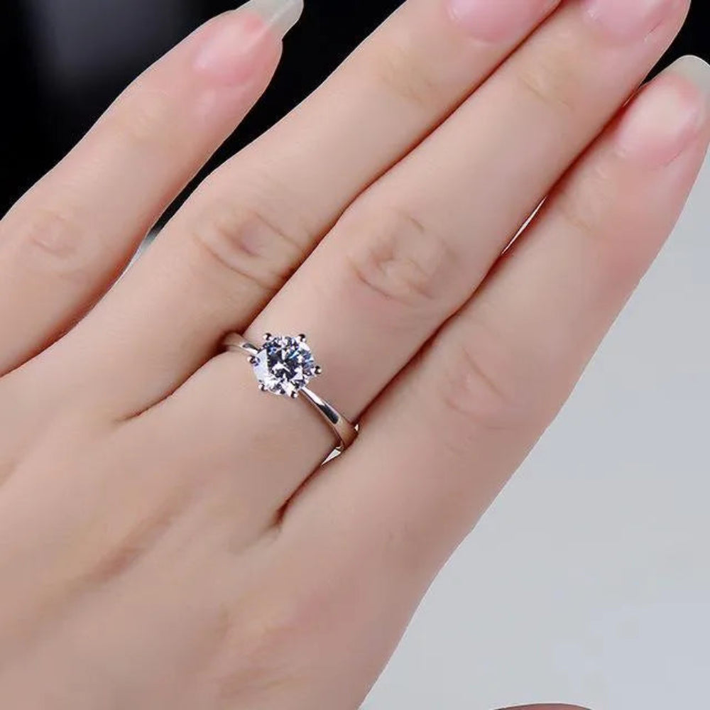 Elegant Adjustable Zirconia Six-Claw Ring – Silver Tone