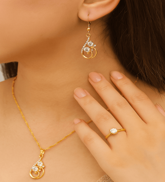 4pcs Women’s Ring, Earring & Necklace Set – Boho Style - Close-up of gold jewelry including earrings, necklace, and ring on a person.