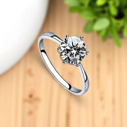 Elegant Adjustable Zirconia Six-Claw Ring – Silver Tone